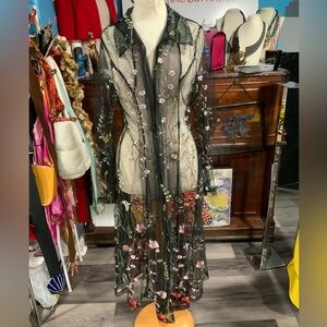 Sheer top with embroidered flowers